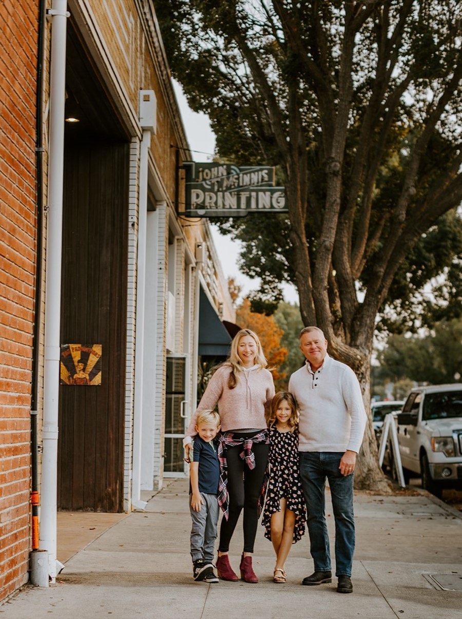 The St. Clair family walking through Old Towne Orange
